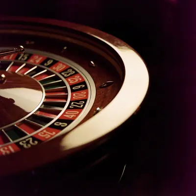 Corner of a roulette wheel in low light